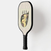 Een bloem binnen pickleball paddle (Links)