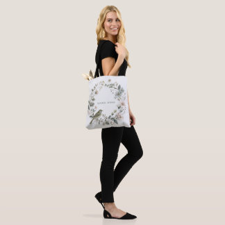 Een bloem en een vogeltje tote bag