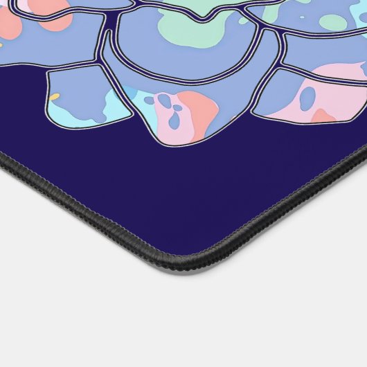 Een bloem gemaakt van verfvlekken bureaumat (Hoek)