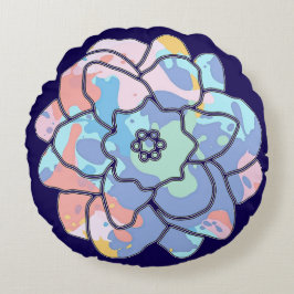 Een bloem gemaakt van verfvlekken rond kussen