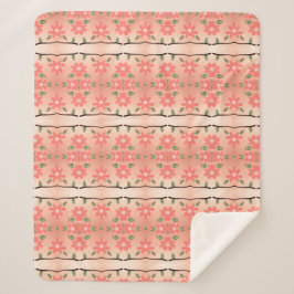 Een bloemige deken in perzik en inktzwart