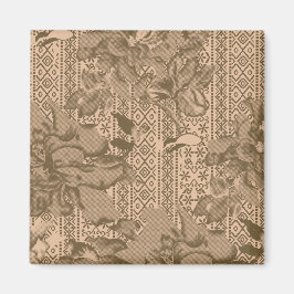 Een  bloemmotief met ingewikkeld bruin desi magneet