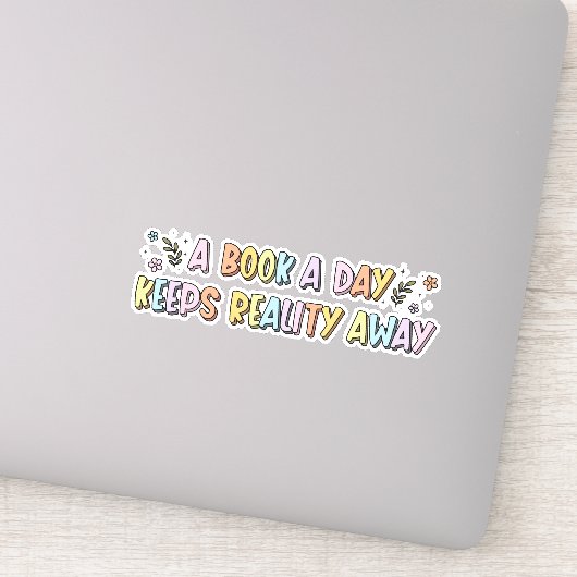 Een boek per dag houdt de realiteit weg boek liefh sticker (Detail)