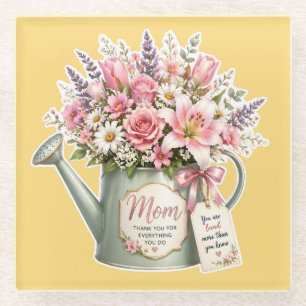 Een boeket bloemen in een gietkan voor mama  glazen onderzetter