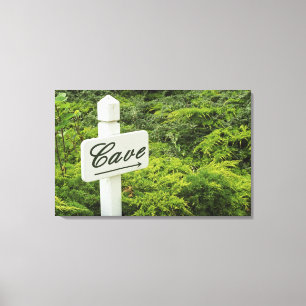 Een bord dat wijst naar de wijnkelder (Cave) in Canvas Afdruk