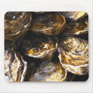 Een bord met oesters. muismat
