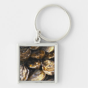 Een bord met oesters. sleutelhanger