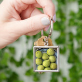 Een bord verse mediterrane vijgen sleutelhanger (Hand)