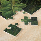Een bosbodem met madeliefjes, primroses, ... legpuzzel (Zijkant)