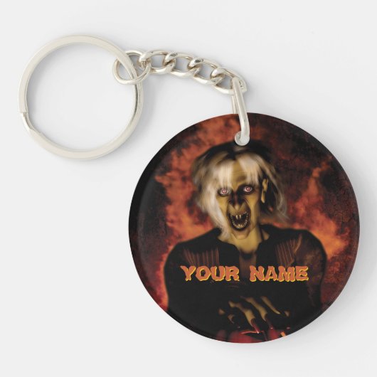 Een boze heks met pompoen. Halloween Sleutelhanger (Voorkant)