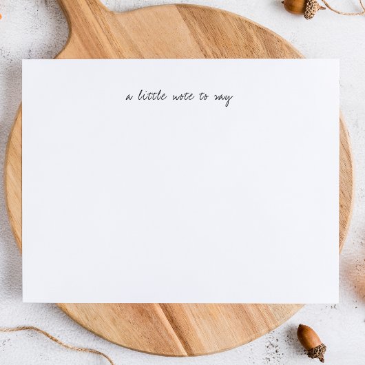 Een briefje om script briefpapier te zeggen notitiekaartje