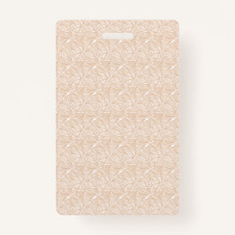 Een bruin tapijt met een ingewikkeld motief ligt o badge