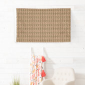 Een bruine en beige achtergrond met een golvend on spandoek (Insitu)