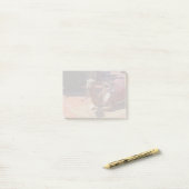 Een bruine kamel met zadelaar en knuppel post-it® notes (Op bureau)