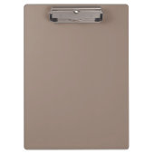 Een bruine muur met een klok erop klembord (Voorkant)