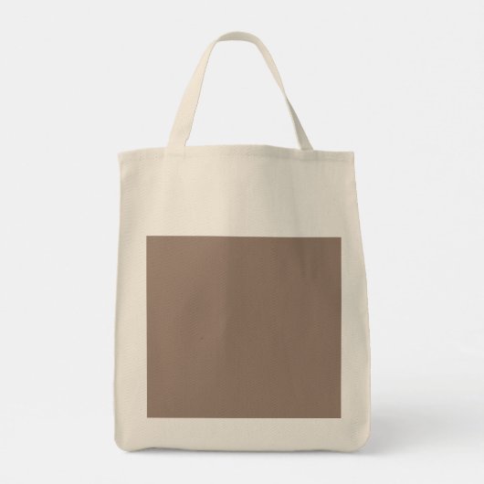 Een bruine muur met een klok erop tote bag (Achterkant)