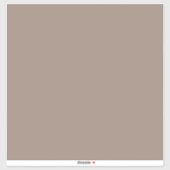 Een bruine muur met een sticker (Vel)