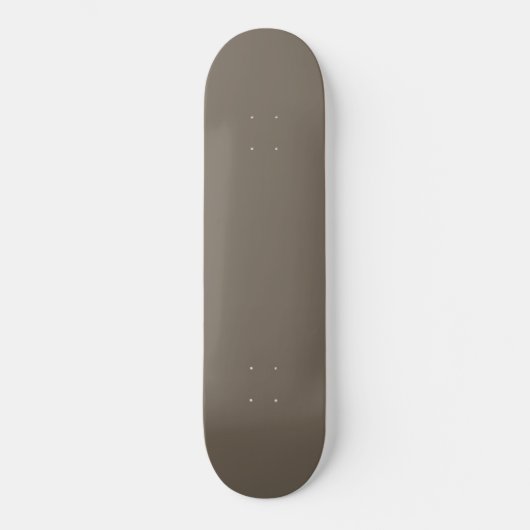 Een bruine muur met een zwart-witte klok erop persoonlijk skateboard (Voorkant)