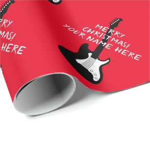 Een cadeau voor kerstfeestdagen met een rotsguitaa cadeaupapier