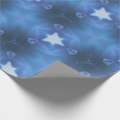 Een cadeaubon met blauwe ster, pakpapier (Hoek)