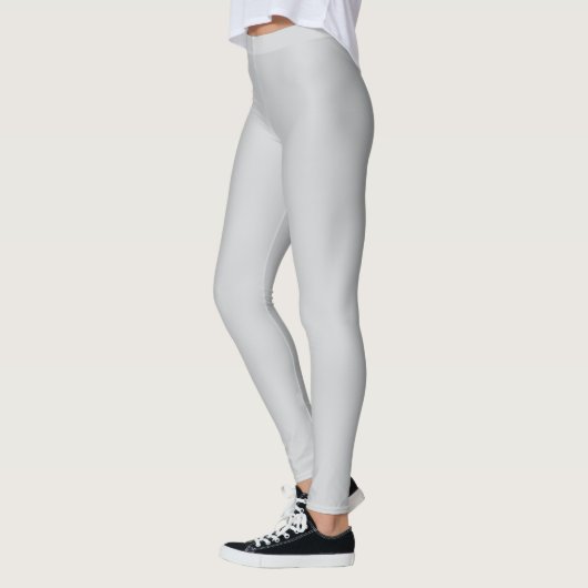Een close-up van een lege witte gestructureerde op leggings (Links)