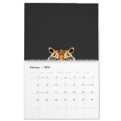 Een close-up van het gezicht van een tijger op een kalender (Feb 2026)