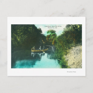 Een Creek Scene met Familie in een Canoe Briefkaart