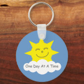 Eén dag tegelijk glimlachend zonnescherm sleutelha sleutelhanger (Voorkant)