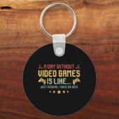 Een dag zonder videogames is als pret videogamer  sleutelhanger (Voorkant)