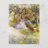 Een dame die een krant leest briefkaart (Voorkant)