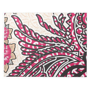 Een decoratief paisley-ontwerp met levendige rode  notitieblok