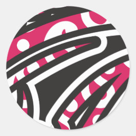 Een decoratief paisley-ontwerp met levendige rode  ronde sticker