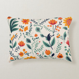 Een decoratieve kussen met een levendig bloemmotie