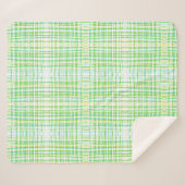 Een deken met een blauw en groen plaid (Voorkant (horizontaal))