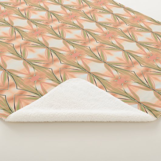 Een deken met een koraal en roze en lichtblauw (3/4)