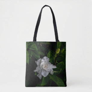 Een delicate witte bloem bloeit tote bag