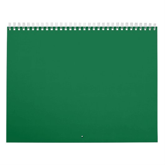 Een diepgroene achtergrond contrasteert met een kn kalender (Hoes)