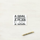 Een doel zonder plan is slechts een wens post-it® notes (Op bureau)