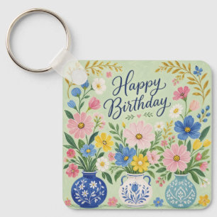 Een drietal verjaardagsbloemen sleutelhanger