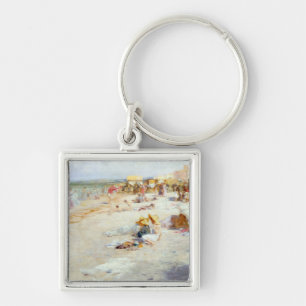 Een druk strand in de zomer sleutelhanger