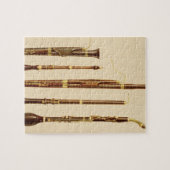 Een dulcus, een oboe, een basson, een oboe da cacc legpuzzel (Horizontaal)