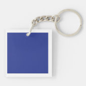 Een effen blauwe achtergrond zonder andere zichtba sleutelhanger (Achterkant)