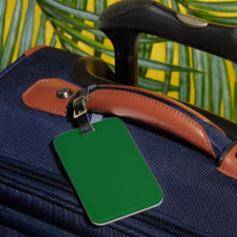 Een effen groene achtergrond vult de hele afbeeldi bagagelabel