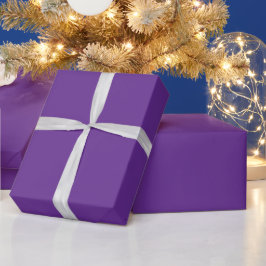 Een effen paarse achtergrond met subtiele vertical cadeaupapier