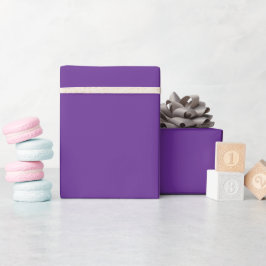 Een effen paarse achtergrond met subtiele vertical cadeaupapier
