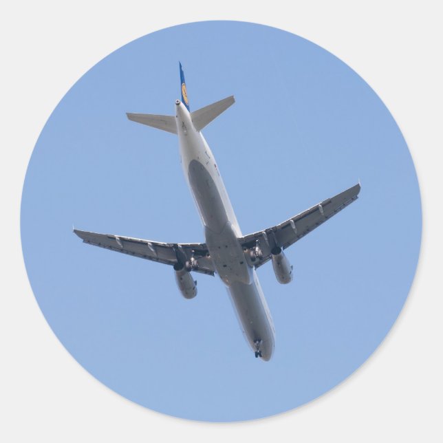 Een enkel vliegtuig op de achtergrond van de blauw ronde sticker (Voorkant)