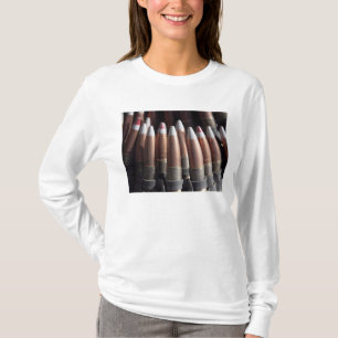 Een even mengeling van vier kogelronden aan één  t-shirt