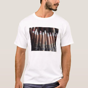 Een even mengeling van vier kogelronden aan één  t-shirt