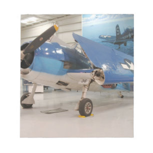 Een F-6F Hellcat-vliegtuig uit de Tweede Wereldoor Notitieblok