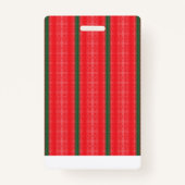 Een felrode appel zit op een effen wit oppervlak. badge (Achterkant)